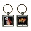 A metal keychain featuring a portrait of Jo from Burst Angel.